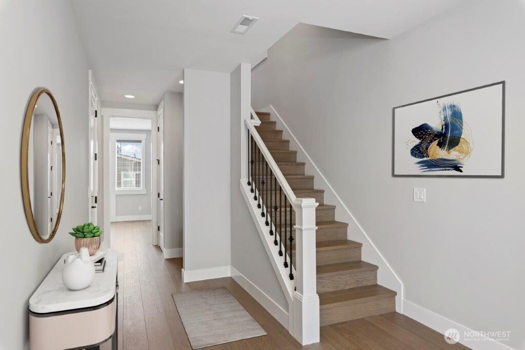 7573 South 130th Place Seattle, WA 98178 - Photo 2 of 10 a view of a hallway with washer and dryer