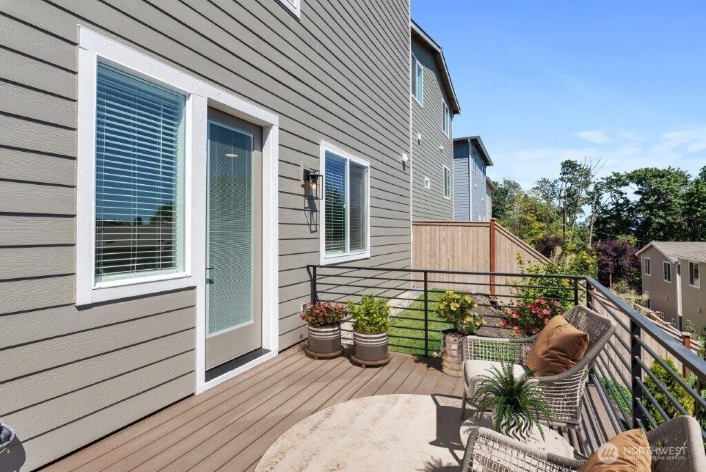 7573 South 130th Place Seattle, WA 98178 - Photo 3 of 10 a view of a house with backyard and sitting area