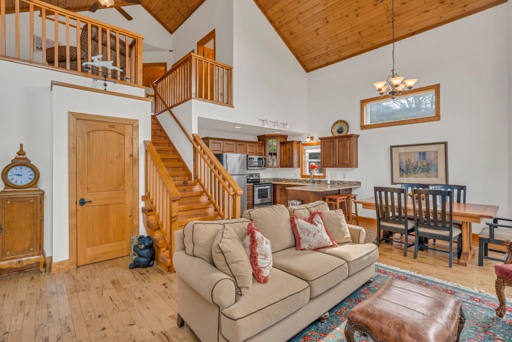 126 Knob Road Blowing Rock, NC 28605 - Photo 11 of 50 a living room with furniture a rug and a window