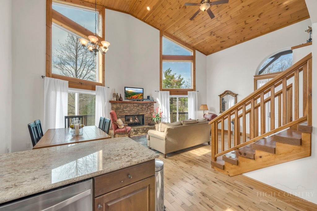 126 Knob Road Blowing Rock, NC 28605 - Photo 15 of 50 a kitchen with sink and a large window