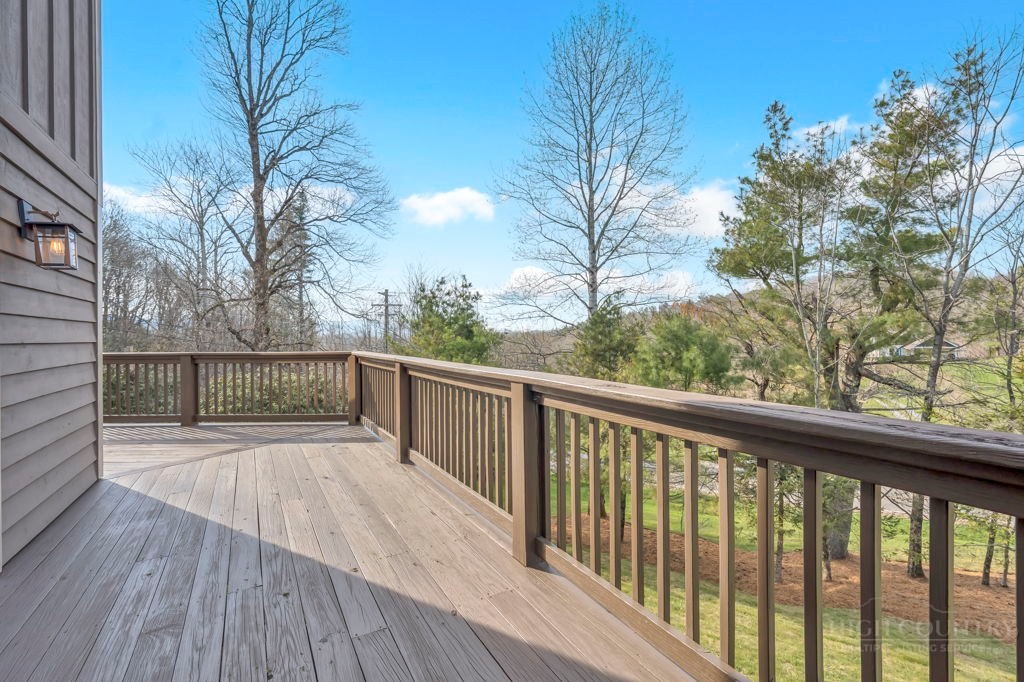126 Knob Road Blowing Rock, NC 28605 - Photo 19 of 50 a view of balcony with wooden floor and fence