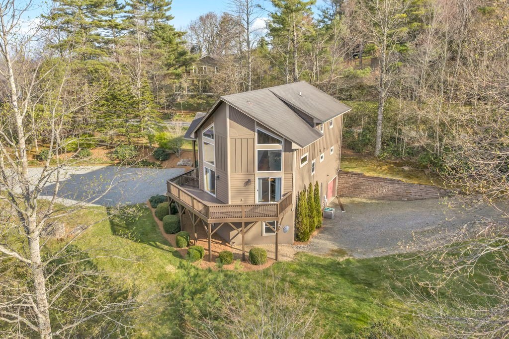 126 Knob Road Blowing Rock, NC 28605 - Photo 3 of 50 a view of a house with a yard