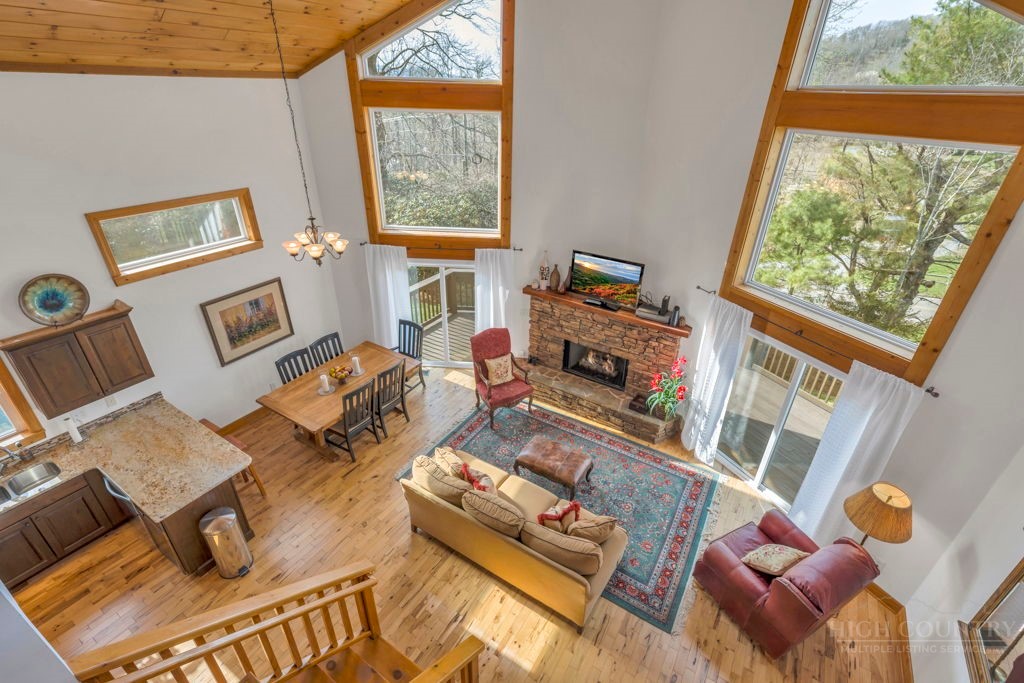 126 Knob Road Blowing Rock, NC 28605 - Photo 31 of 50 a living room with furniture and a window