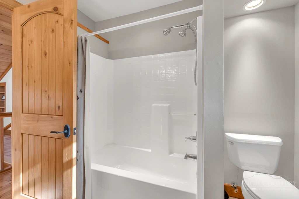 126 Knob Road Blowing Rock, NC 28605 - Photo 39 of 50 a bathroom with a shower and a toilet