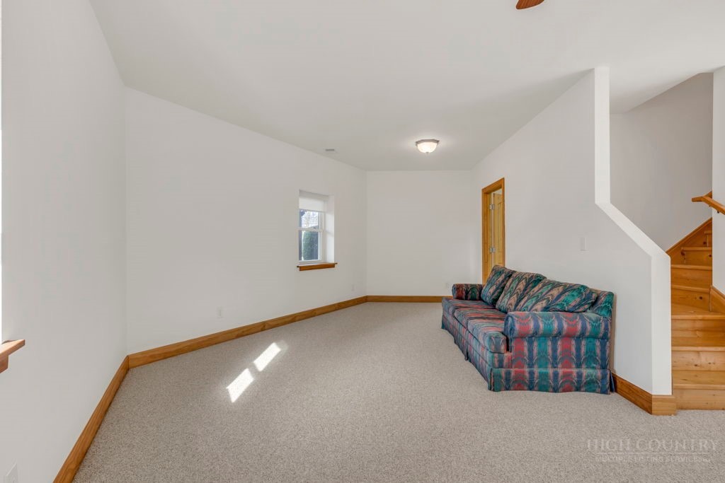 126 Knob Road Blowing Rock, NC 28605 - Photo 40 of 50 a view of an empty room with windows