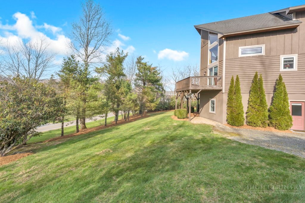 126 Knob Road Blowing Rock, NC 28605 - Photo 5 of 50 a view of a front of a house with a yard
