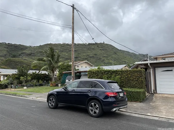 a car parked in front of a house