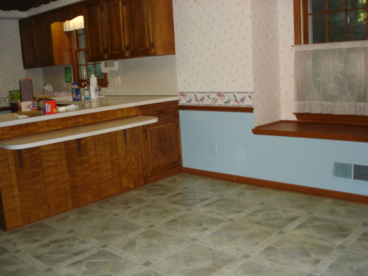 4516 Oak Park Road Raleigh, NC 27612 - Photo 6 of 17 Breakfast, Lunch or a Quick Dinner in this Area adjacent to the Kitchen and Family Room Breakfast Nook