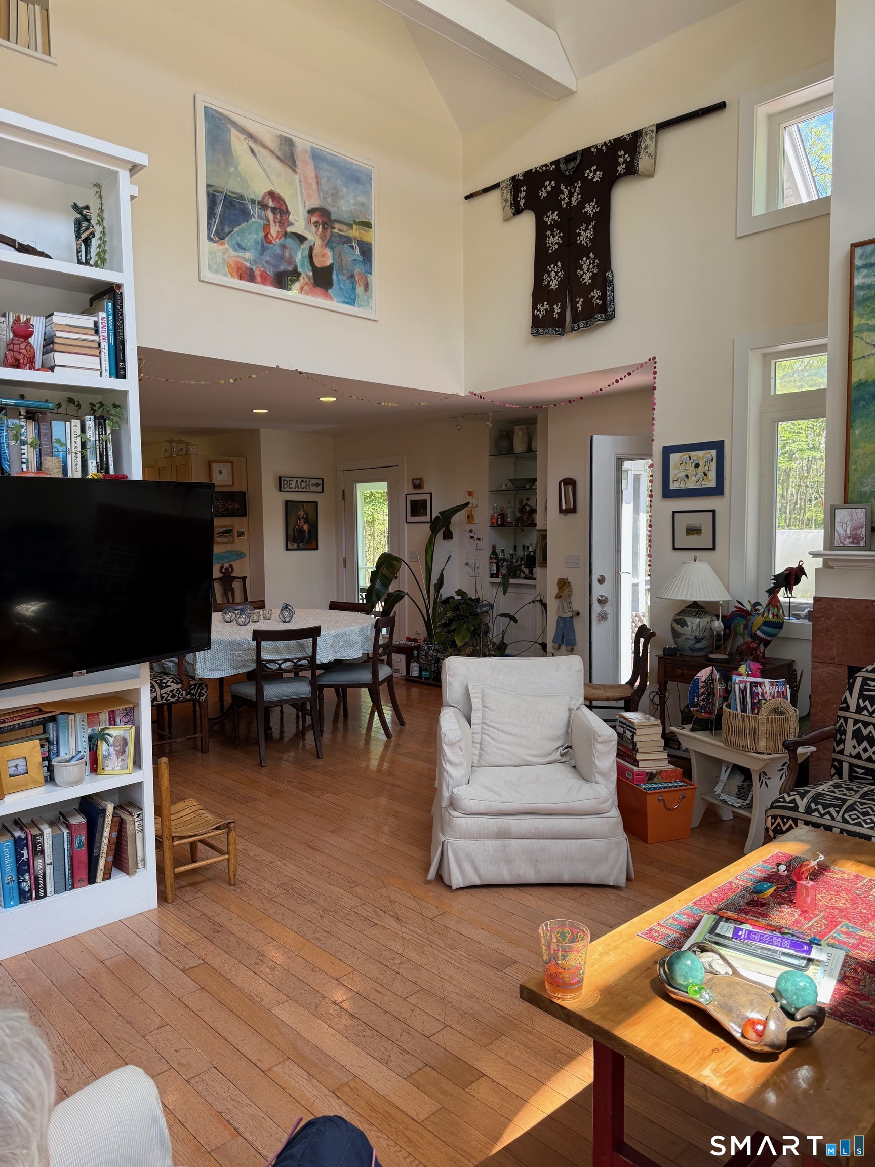 221 Wamphassuc Road Stonington, CT 06378 - Photo 6 of 11 Living room into dining area
