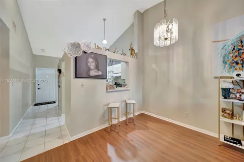 a view of livingroom with furniture and wooden floor