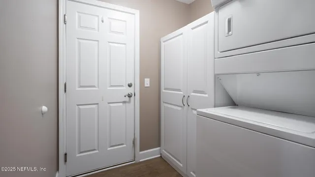 a utility room with dryer and washer