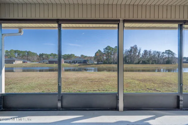 a view of a lake from a balcony