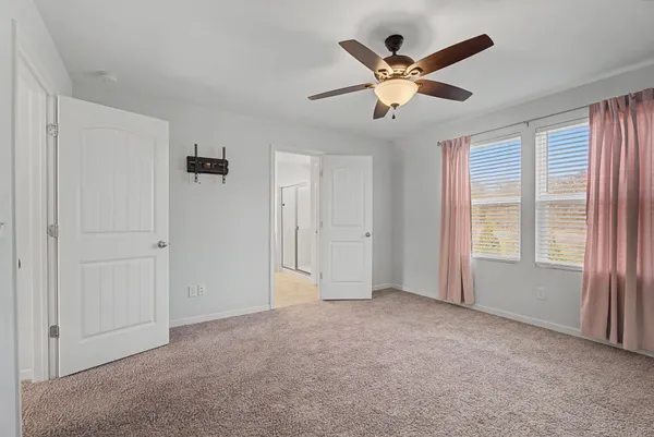 a bathroom with a double vanity sink and mirror