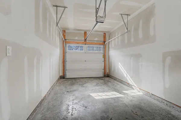 a view of swimming pool with outdoor seating and yard in back