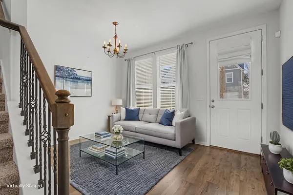 a view of entryway with wooden floor