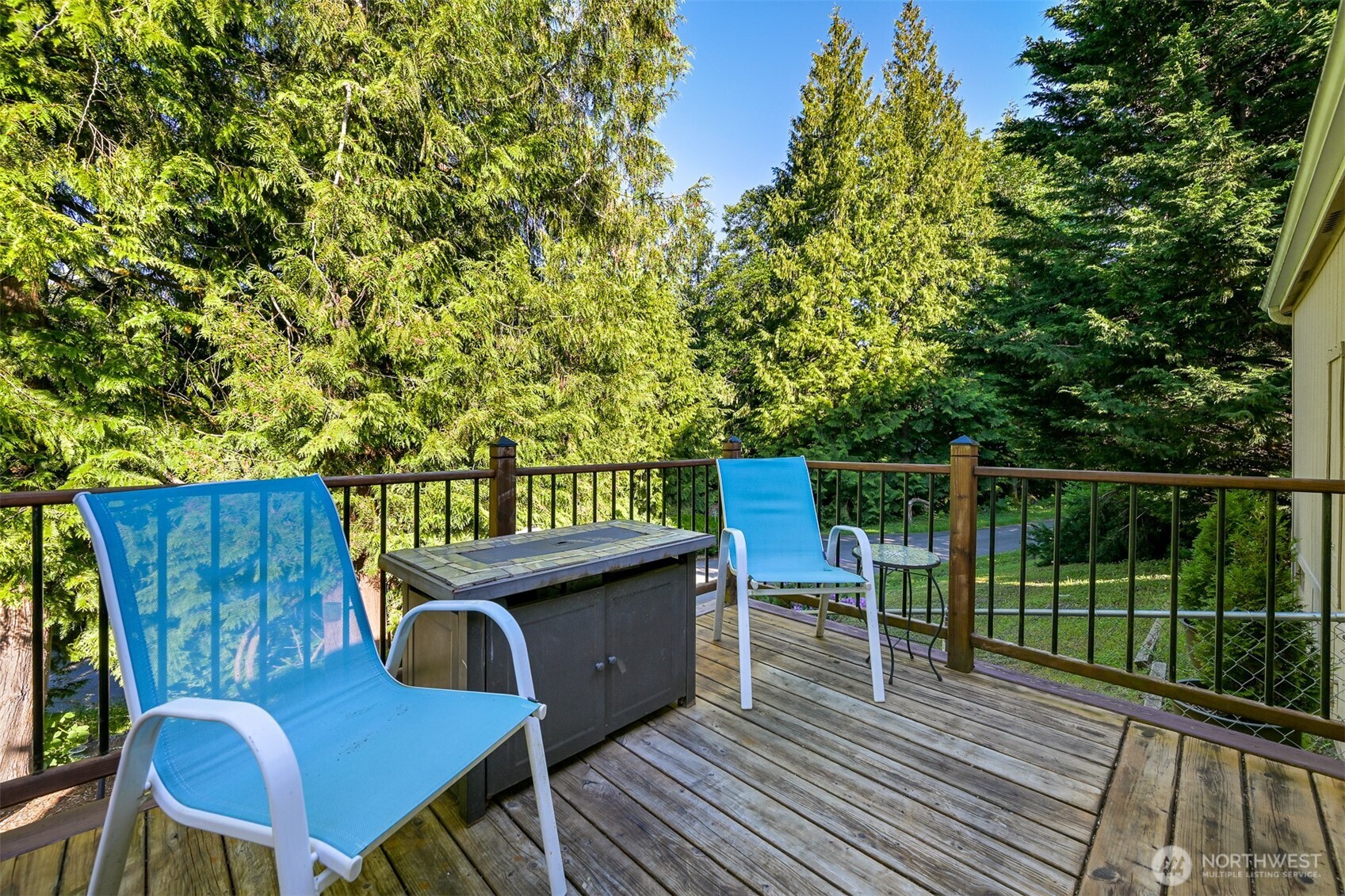 2174 Yew Street Road, Unit 22 Bellingham, WA 98229 - Photo 28 of 36 a view of a balcony with chairs
