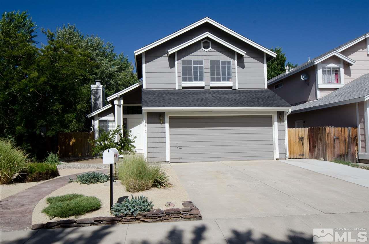 2741 Azuza Way Reno, NV 89502 - Photo 1 of 1 a front view of a house with a yard and garage