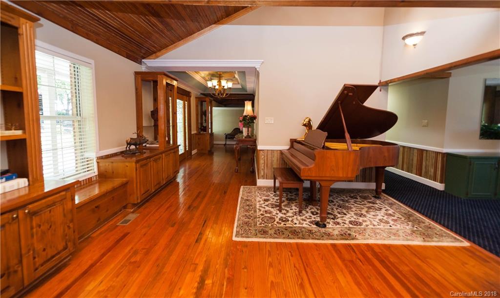 1491 Ballenger Road Inman, SC 29349 - Photo 13 of 35 a living room filled with furniture hardwood floor and a rug