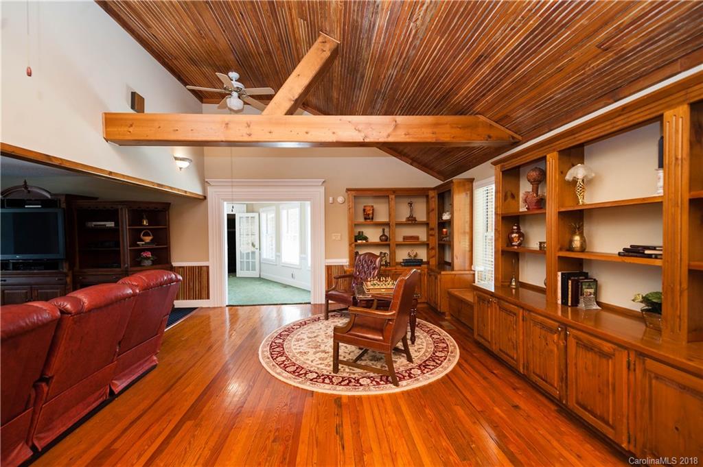 1491 Ballenger Road Inman, SC 29349 - Photo 14 of 35 a dining room with wooden floor and furniture