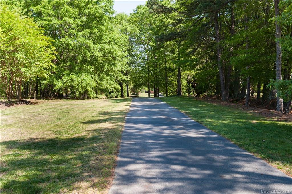 1491 Ballenger Road Inman, SC 29349 - Photo 3 of 35 a backyard of a house with lots of green space