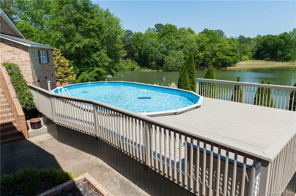 1491 Ballenger Road Inman, SC 29349 - Photo 32 of 35 a view of a balcony with wooden floor and fence