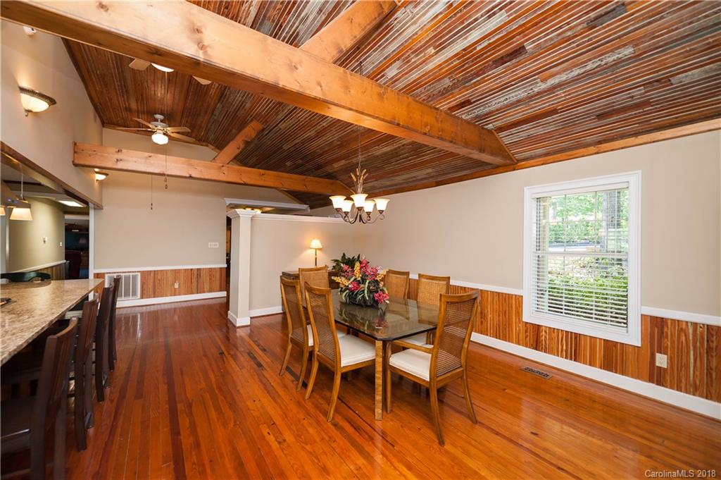 1491 Ballenger Road Inman, SC 29349 - Photo 9 of 35 a dining room with furniture and wooden floor