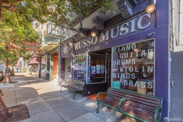 a view of a brick building with a large window