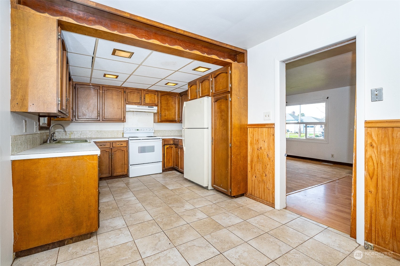 738 Southwest 19th Street Chehalis, WA 98532 - Photo 16 of 40 a kitchen with stainless steel appliances granite countertop a refrigerator and a stove top oven