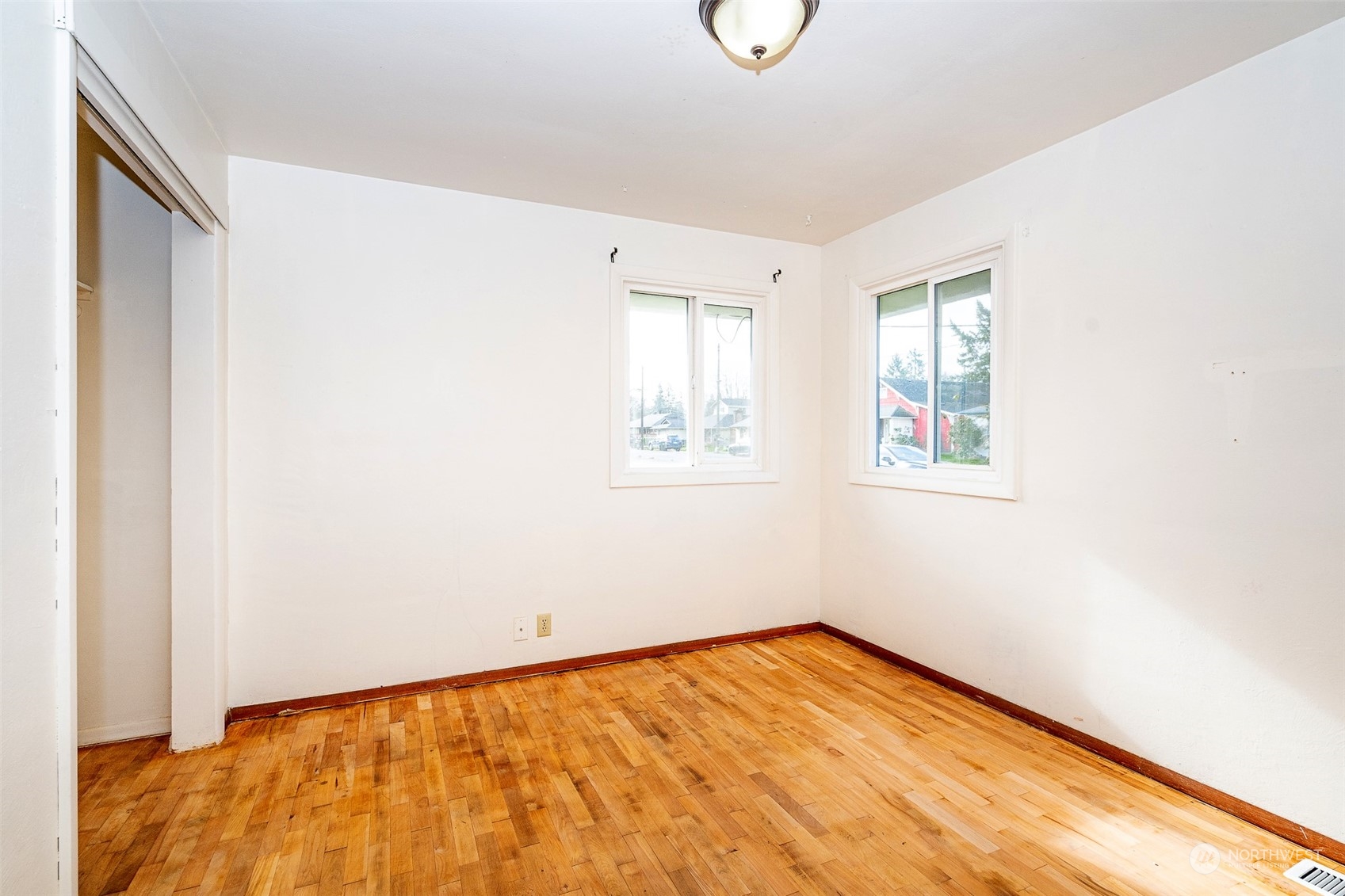 738 Southwest 19th Street Chehalis, WA 98532 - Photo 26 of 40 a view of empty room with wooden floor and fan