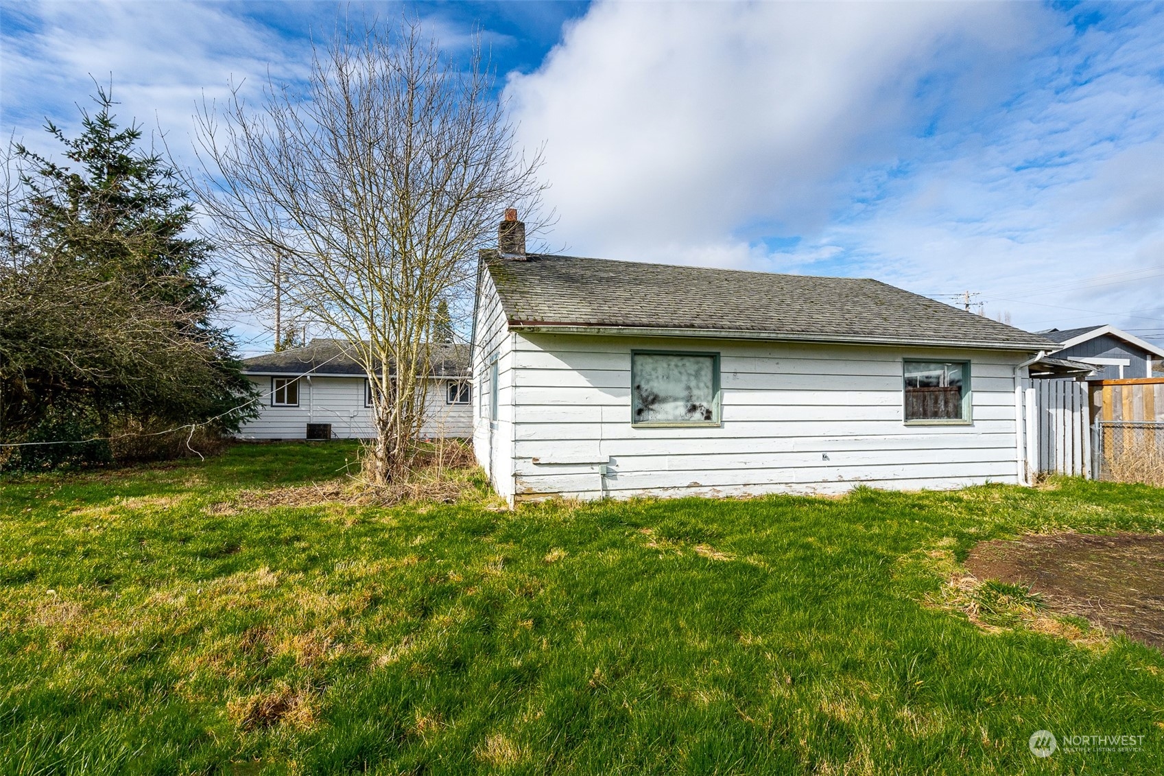 738 Southwest 19th Street Chehalis, WA 98532 - Photo 38 of 40 a front view of a house with a yard