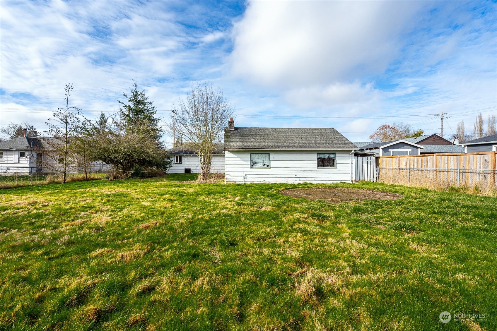 738 Southwest 19th Street Chehalis, WA 98532 - Photo 39 of 40 a view of a house with a big yard and large tree