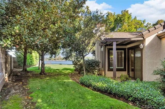 a view of house with a garden
