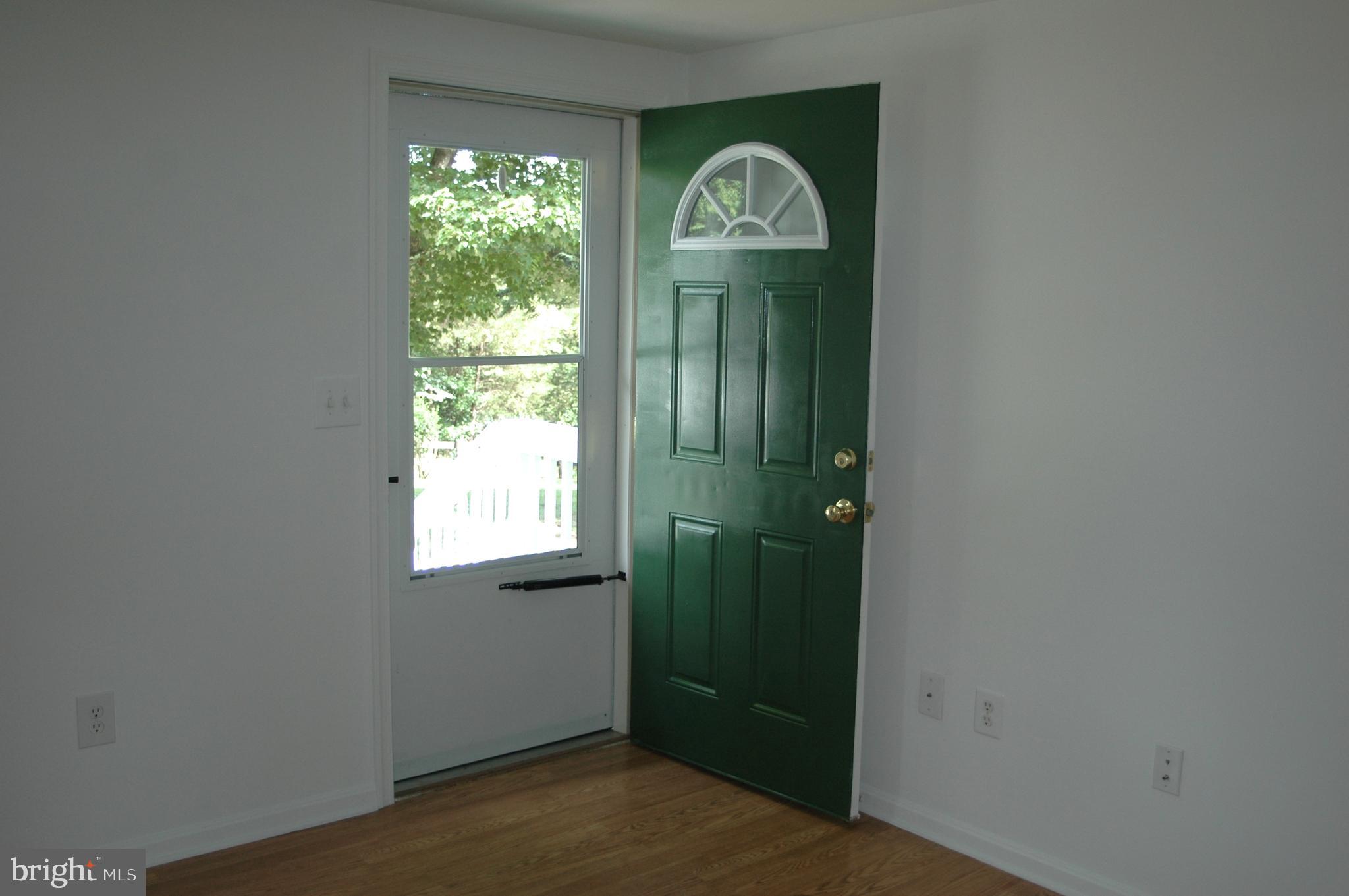251 Scrabble Road Castleton, VA 22716 - Photo 4 of 23 a view of front door with a mirror