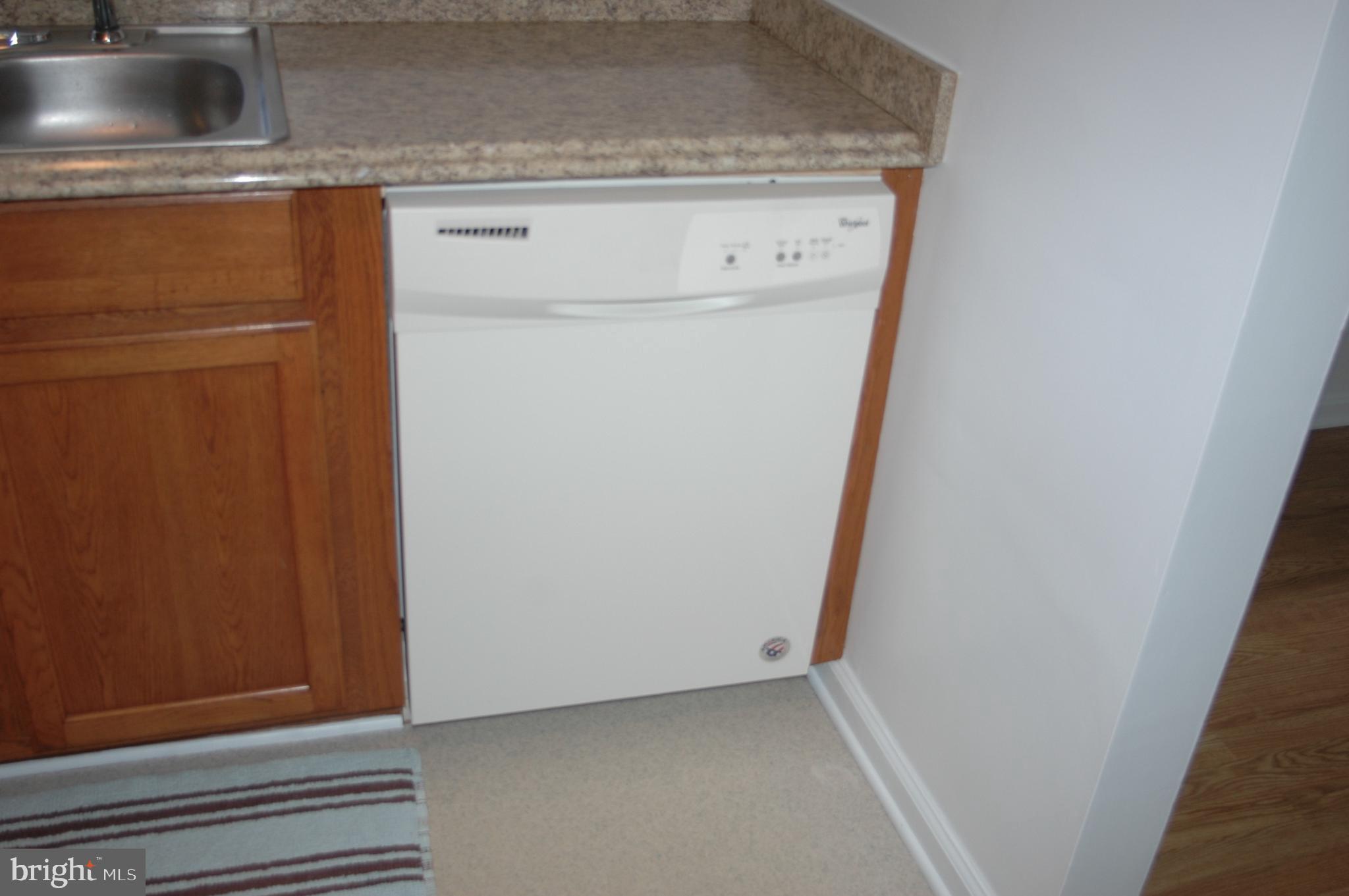 251 Scrabble Road Castleton, VA 22716 - Photo 8 of 23 a utility room with dryer and washer