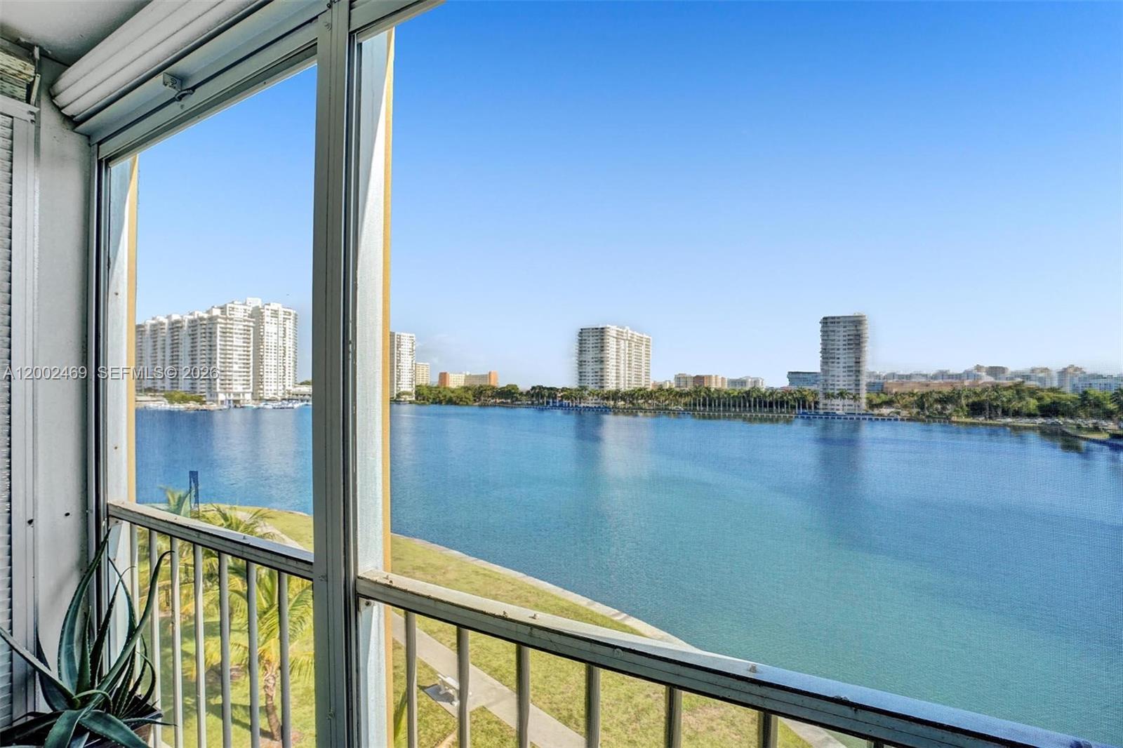 2999 Point E Drive, Unit C511 Aventura, FL 33160 - Photo 23 of 33 a view of a lake from a balcony