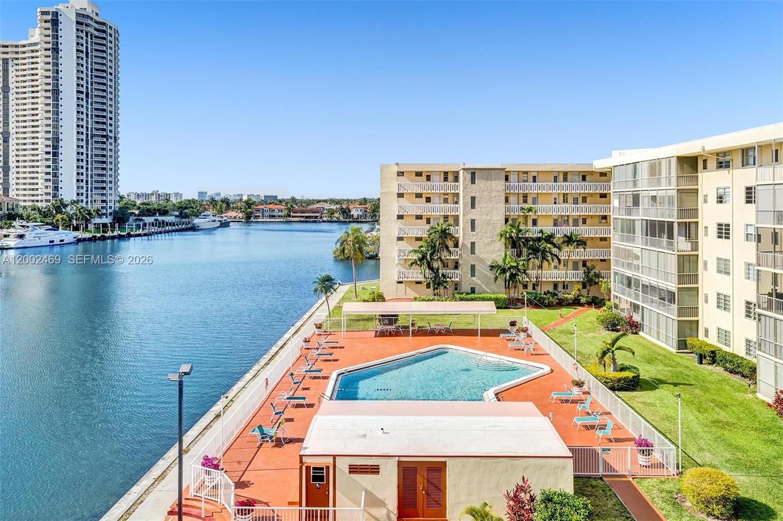 2999 Point E Drive, Unit C511 Aventura, FL 33160 - Photo 24 of 33 swimming pool view with a outdoor seating space