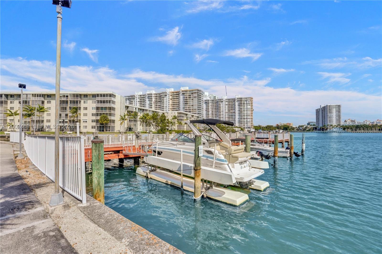 2999 Point E Drive, Unit C511 Aventura, FL 33160 - Photo 26 of 33 a view of a terrace with lawn chairs
