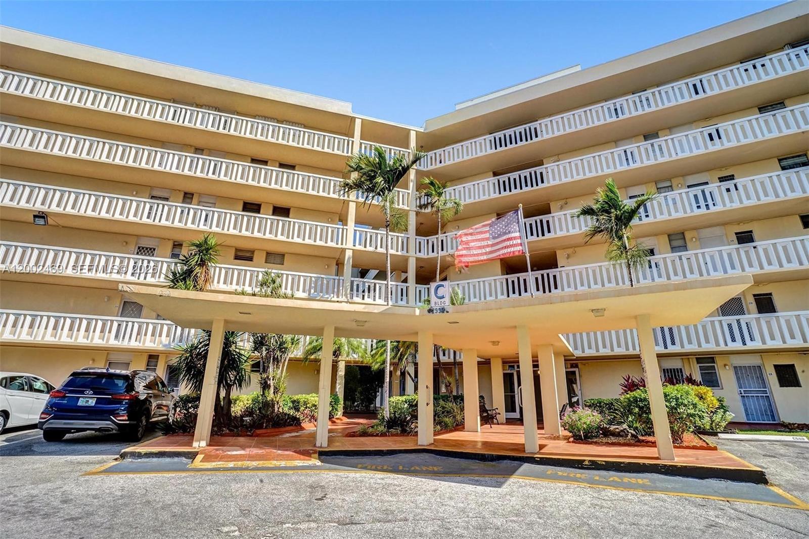 2999 Point E Drive, Unit C511 Aventura, FL 33160 - Photo 33 of 33 front view of a building with a street