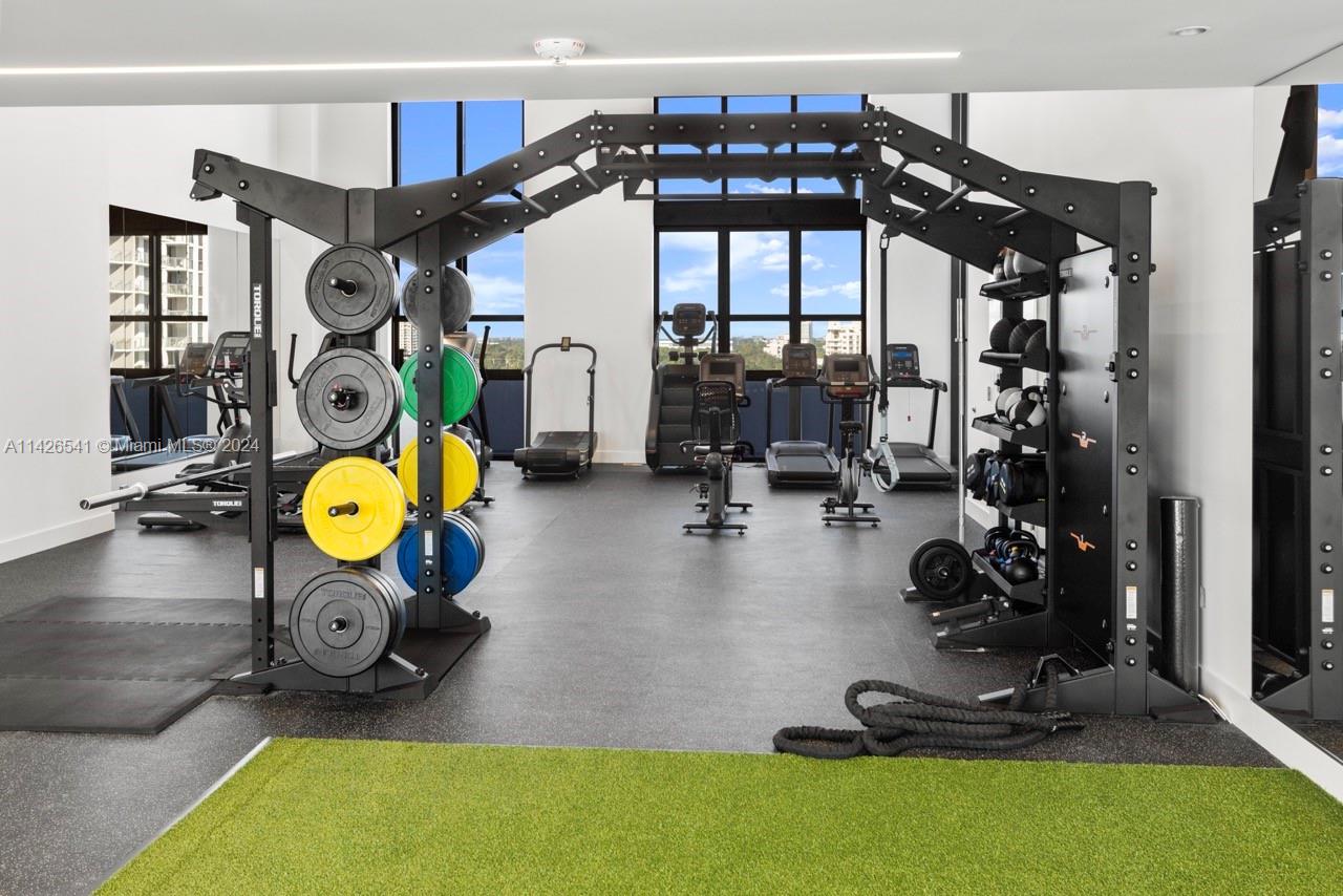 2800 Southwest 27th Terrace, Unit 616 Miami, FL 33133 - Photo 12 of 14 a gym hall with exercise machine