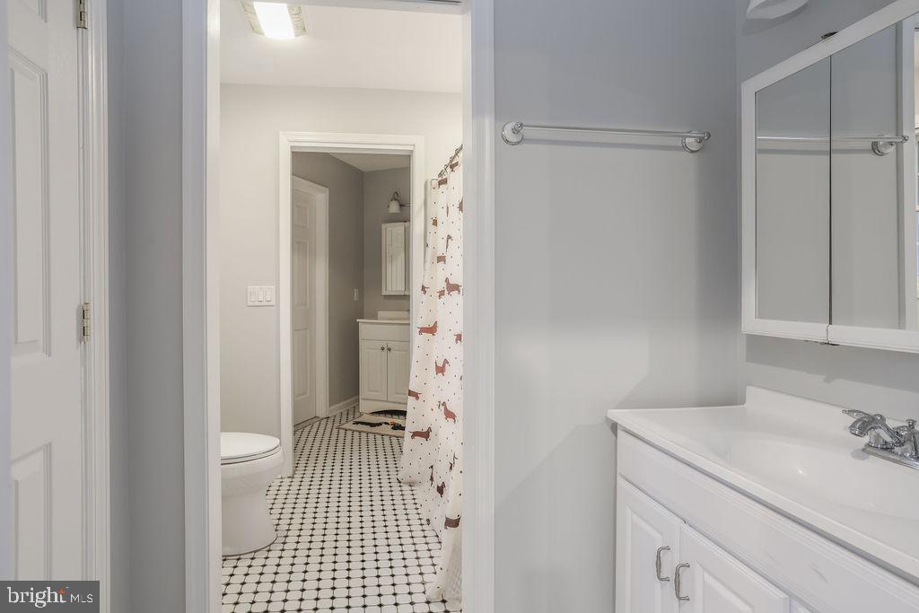 5 Popper Street Manahawkin, NJ 08050 - Photo 24 of 74 a bathroom with a sink toilet and shower