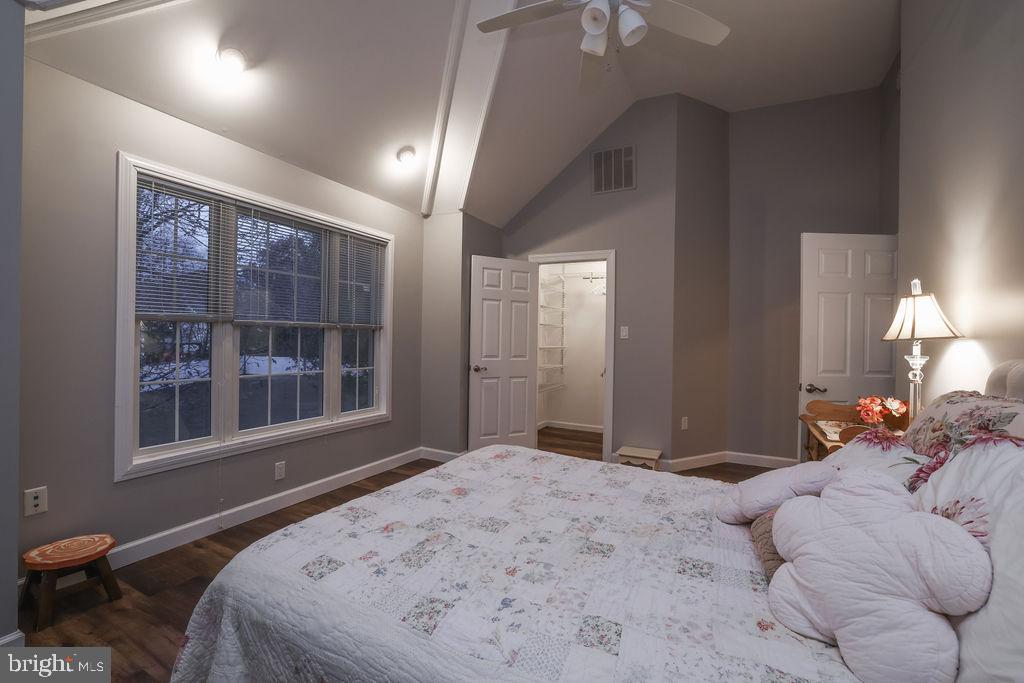 5 Popper Street Manahawkin, NJ 08050 - Photo 32 of 74 a bedroom with a bed and a large window