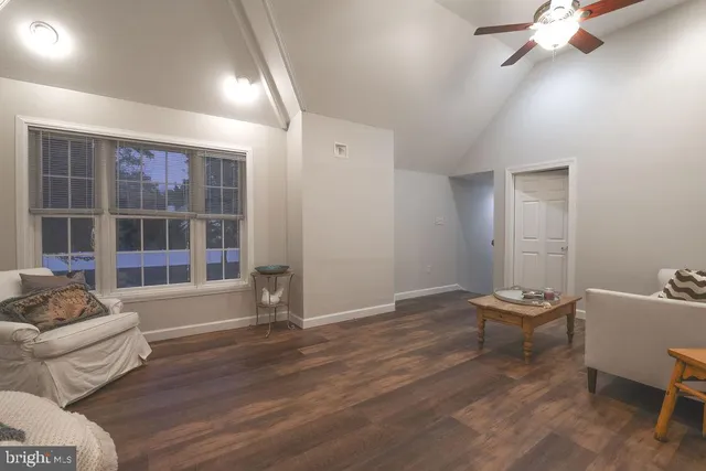 a bathroom with a shower and a sink