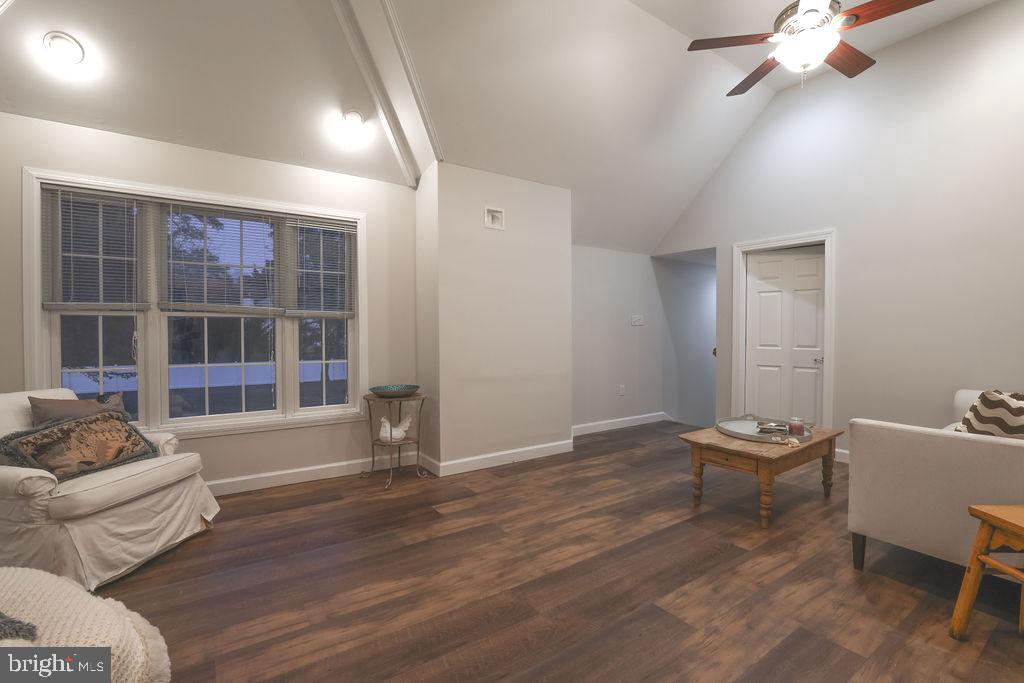 5 Popper Street Manahawkin, NJ 08050 - Photo 36 of 74 a living room with furniture and a large window