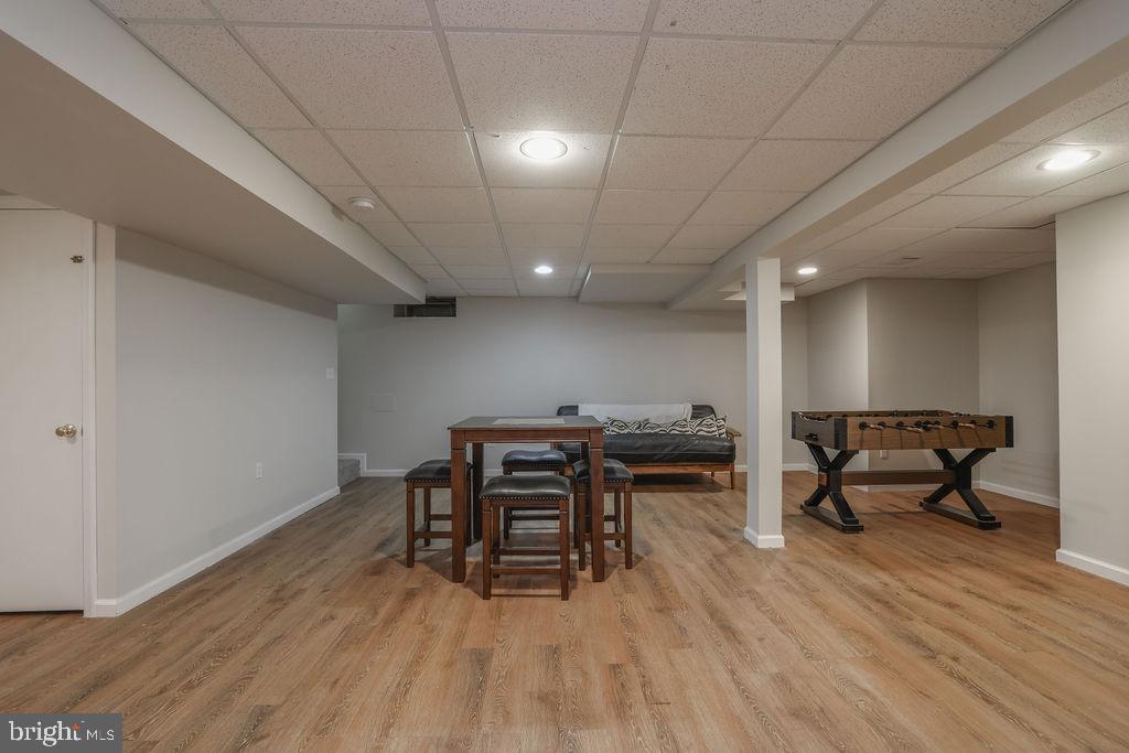 5 Popper Street Manahawkin, NJ 08050 - Photo 55 of 74 a view of a work space with wooden floor and furniture