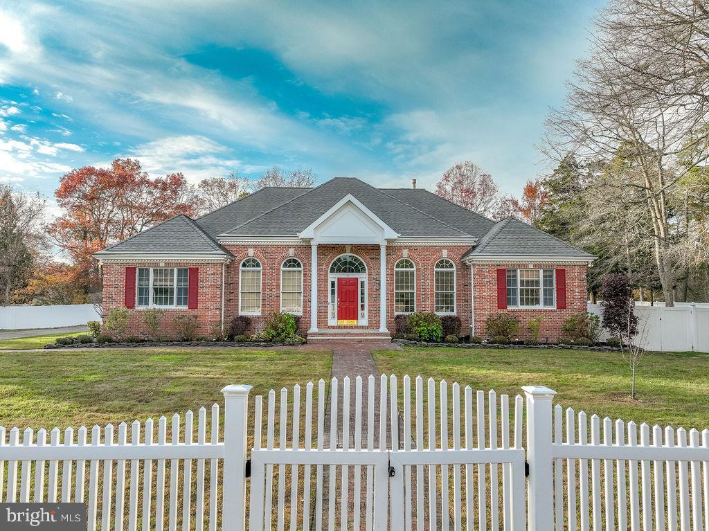 5 Popper Street Manahawkin, NJ 08050 - Photo 58 of 74 a front view of a house with a garden