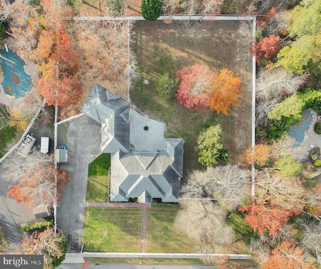 5 Popper Street Manahawkin, NJ 08050 - Photo 72 of 74 an aerial view of a house with a yard