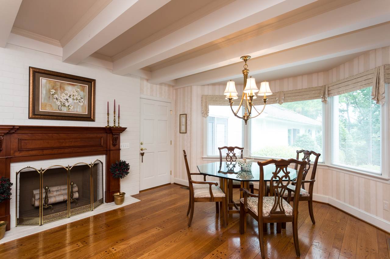 46 East Roman Ridge Road Mount Sidney, VA 24467 - Photo 4 of 50 a dining room with furniture window fireplace and wooden floor