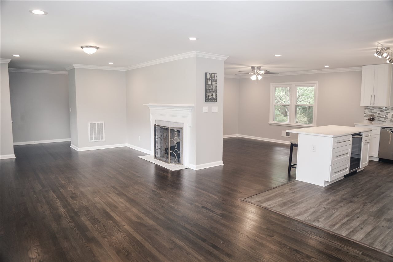 2910 Haven Road Raleigh, NC 27610 - Photo 21 of 25 LR fireplace kitchen familyroom