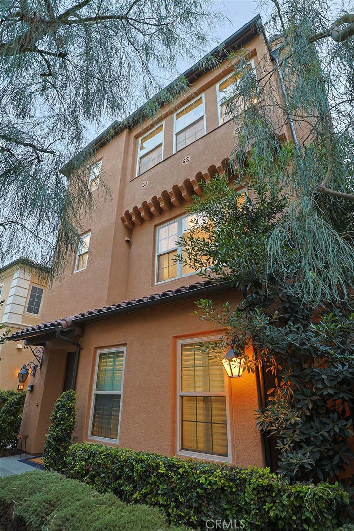 78 Kestrel Irvine, CA 92618 - Photo 1 of 32 a front view of a house with a yard