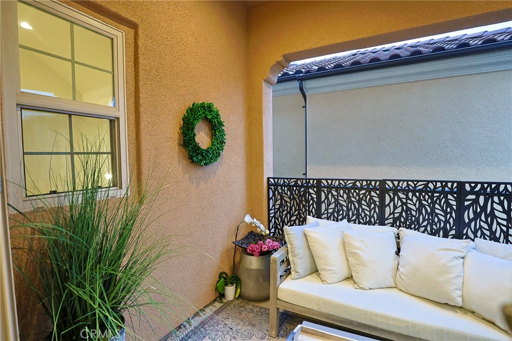 78 Kestrel Irvine, CA 92618 - Photo 26 of 32 a wooden bench sitting in front of a window